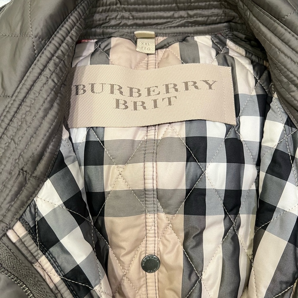 Mid length Olive Green lightweight puffer with zip off hood, belted waist.